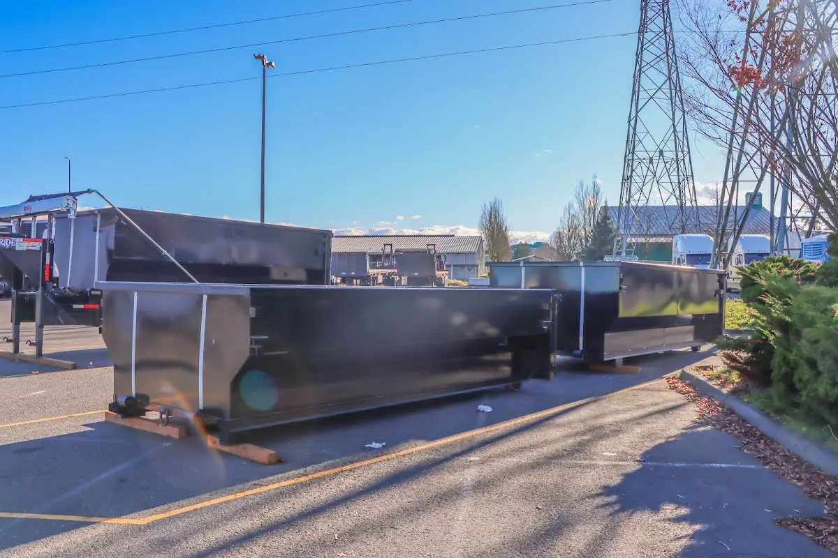 Roll-off dumpster ready for waste disposal at job site for 3 Yard Dumpster Rental in Utica